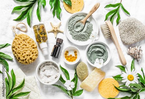 Flat lay beauty skin care ingredients, accessories. Natural beauty products on a light background, top view
