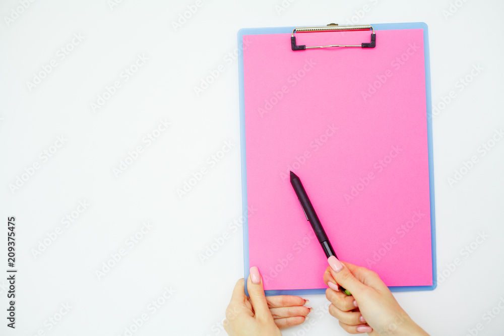 Blank Folder with Pink Paper. Hand that Holding Folder and Pen on White Background. Copyspace. Place for Text. Blank Folder with Pink Paper. Hand that Holding Folder and Pen on White Background. Copyspace. Place for Text.