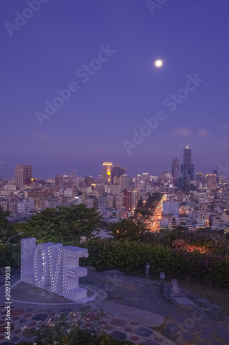 The love viewing platform of Martyrs' Shrine, one of famous attractions in Kaohsiung City, Taiwan. Tourists and couples love to enjoy the beautiful cityscape in the evening.
