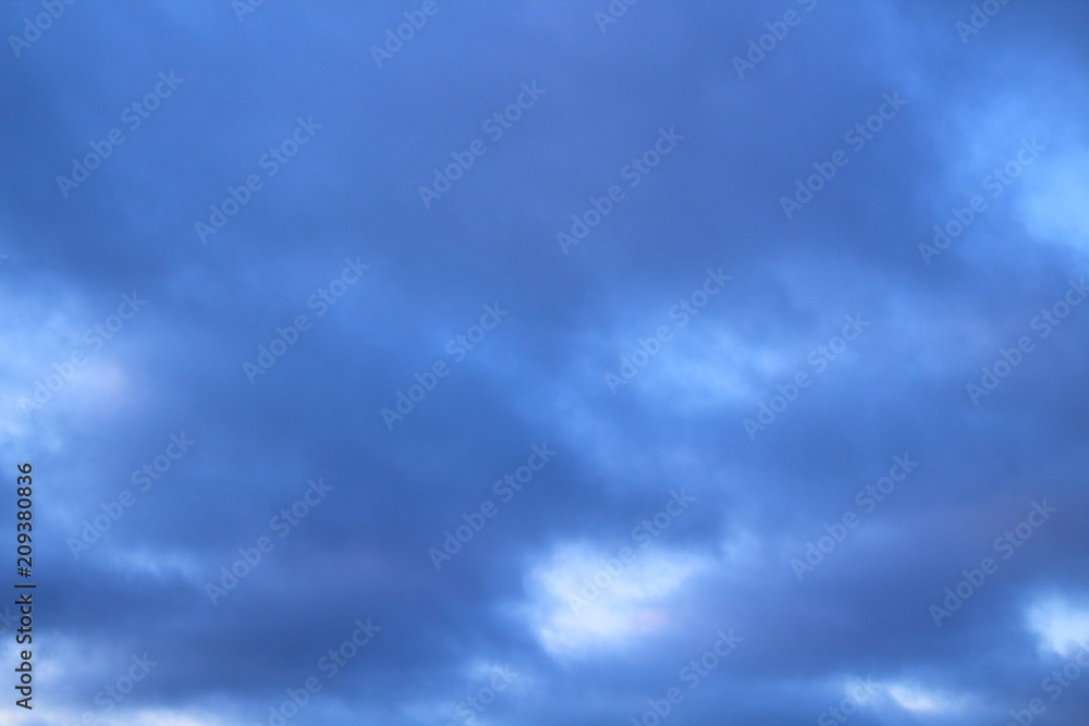 Cloudy sky with clouds in winter. Background.
