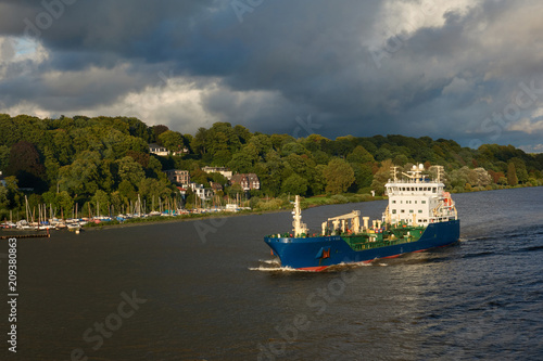 Bunkering vessel on the Elbe river in the city of Hamburg