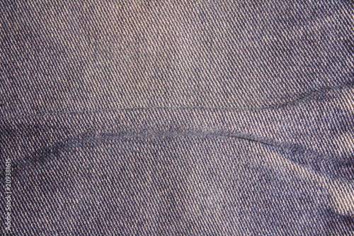 Blue shabby jeans. Denim. Close-up. Background. Texture.