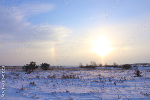 The halo phenomenon. Sunrise. Landscape. Russia  January  2018.
