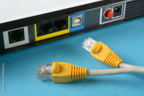 Obraz na płótnie network cables - modem router - internet connection