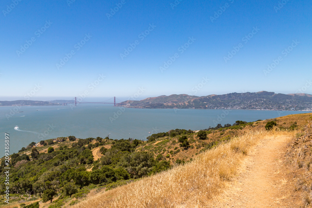 Looking towards the Golden Gate Bridge, from a pathway on Angel Island Looking towards the Golden Gate Bridge, from a pathway on Angel Island