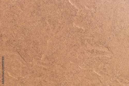 The texture of the stone tiles brown