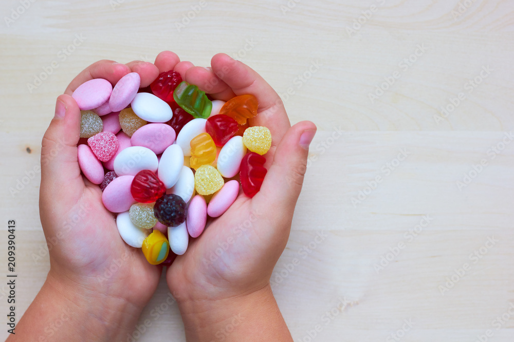 There are a lot of sweets in hand. There are a lot of sweets in hand.