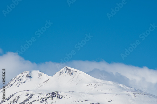 The snowy mountain peak of Sulur in North Iceland