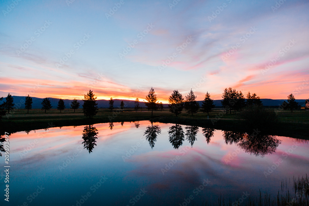 Sunrise over a Pond in the Rock Mountains