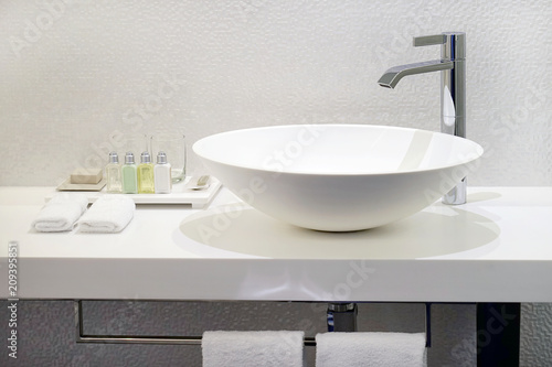 Bathroom interior sink with modern design. Interior of bathroom with washbasin and faucet