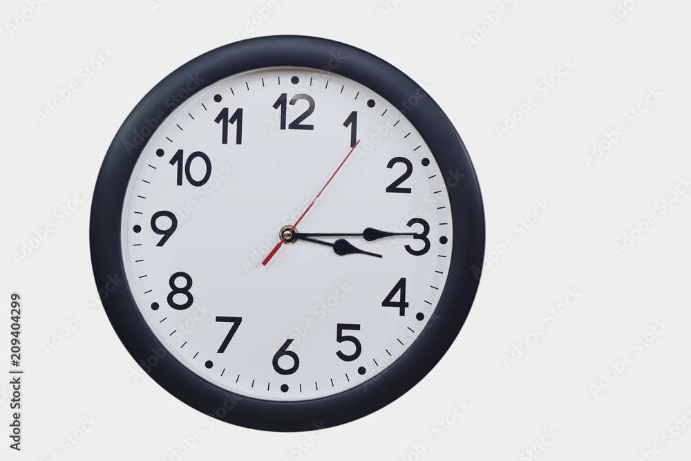 Time concept with black clock at a quarter past three am or pm Time concept with black clock at a quarter past three am or pm