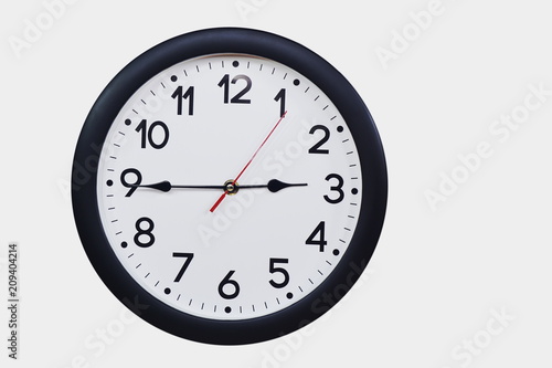 Time concept with black clock at a quarter to three am or pm