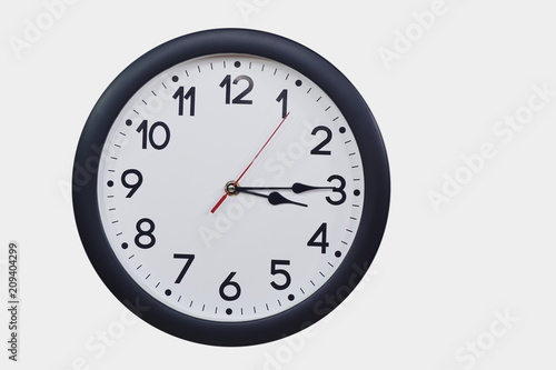 Time concept with black clock at a quarter past three am or pm