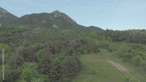 AERIAL view Flight over a country road. 4K Made on Mavik Air 100kbps. Mountain view photo