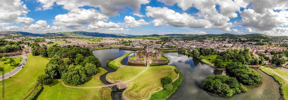 Aerial view of Caerphilly castle in summer, Wales - obrazy, fototapety, plakaty 
