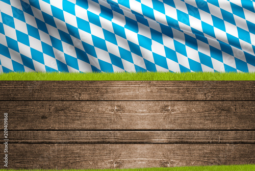 Obraz na plátne bavaria flag and green grass 3d rendering with wooden background