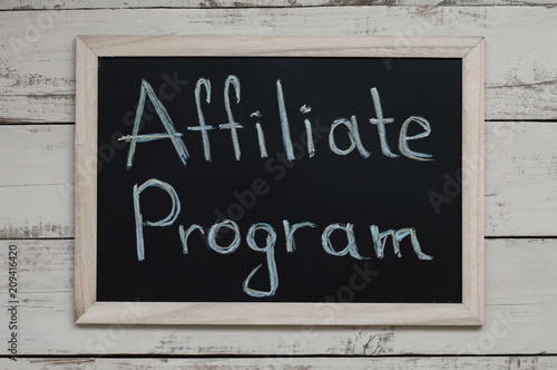 Affiliate Program concept. Affiliate marketing. Blackboard with handwritten text, top view