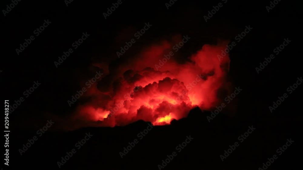 Big island, Hawaii, Lava flowing into the ocean, making big steam cloud, fire meets water Big island, Hawaii, Lava flowing into the ocean, making big steam cloud, fire meets water