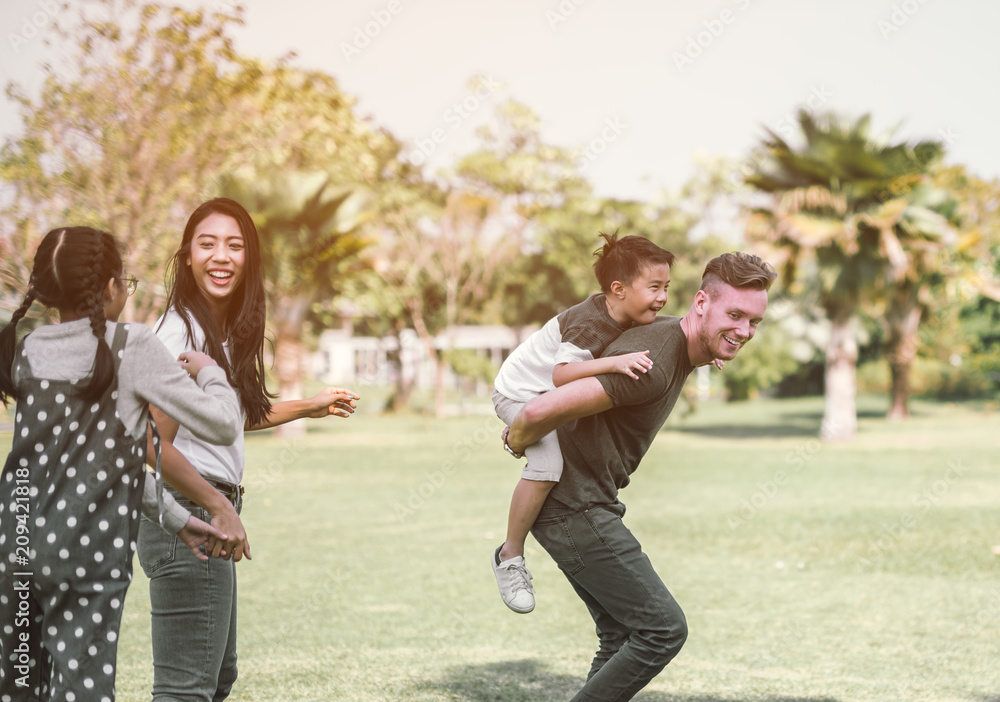 Dad and son having fun outdoors.concept of a happy family.