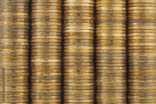 Stacks of golden coins. Coin backdrop.