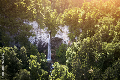 drone flight over giant big waterfall called Wildensteiner waterfall in austria