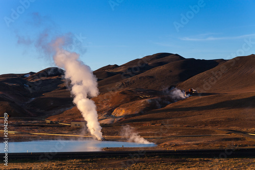 Steam from thermal springs in the desert landscape of Iceland