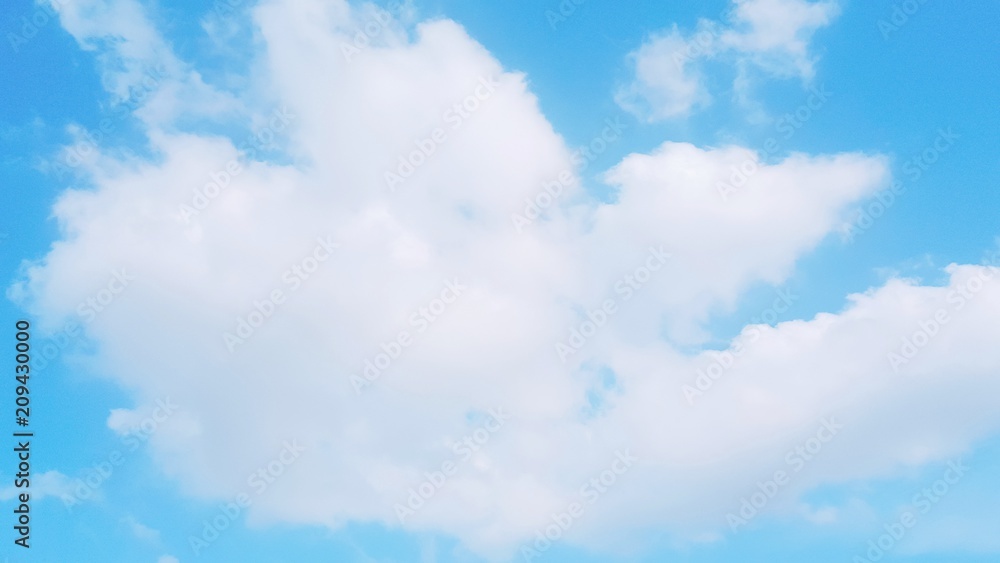 Many big clouds and azure sky background.The atmosphere in the blue sky with copy space .The weather is clear today.meteorology