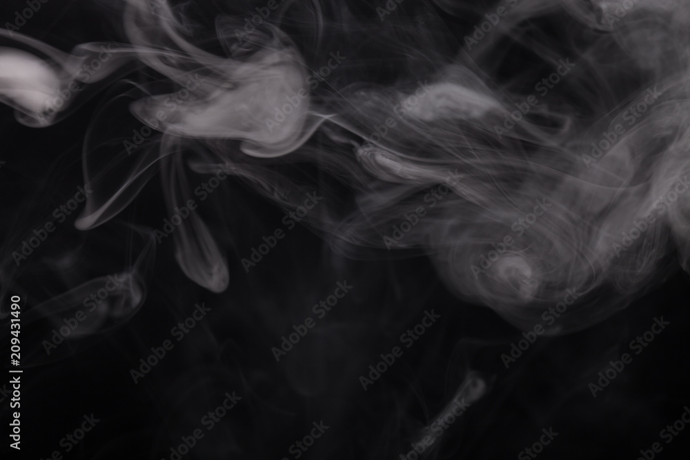 Cloud of smoke on black background. Selective focus Cloud of smoke on black background. Selective focus