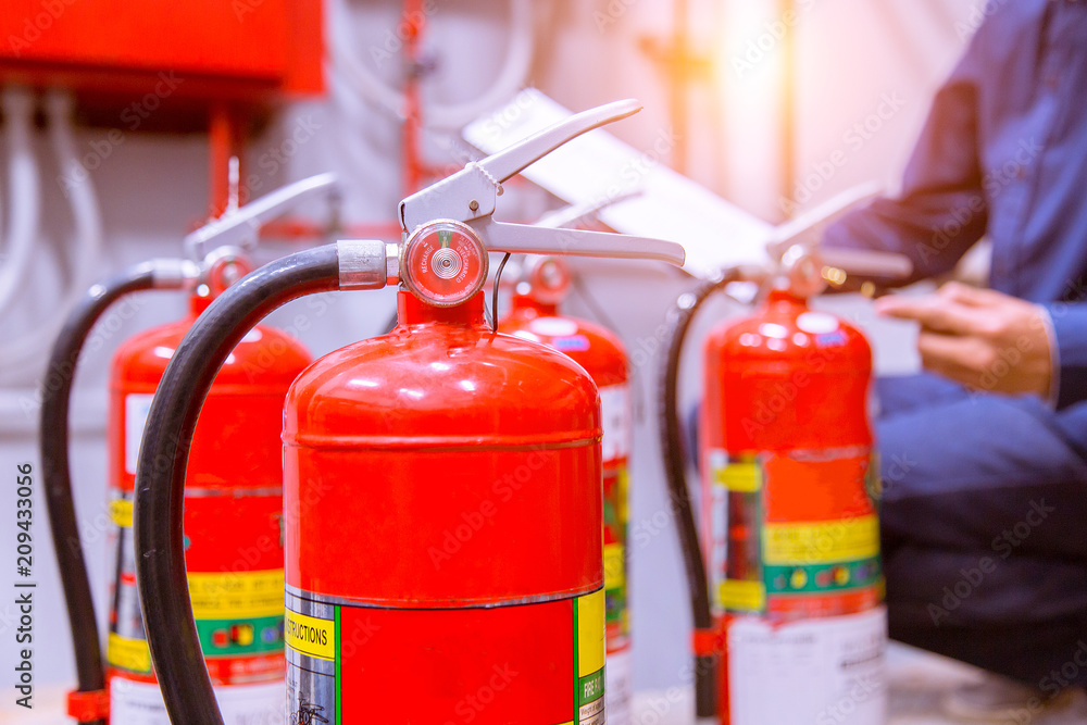 Engineer checking Industrial fire control system,Fire Alarm controller, Fire notifier, Anti fire.System ready In the event of a fire. Engineer checking Industrial fire control system,Fire Alarm controller, Fire notifier, Anti fire.System ready In the event of a fire.