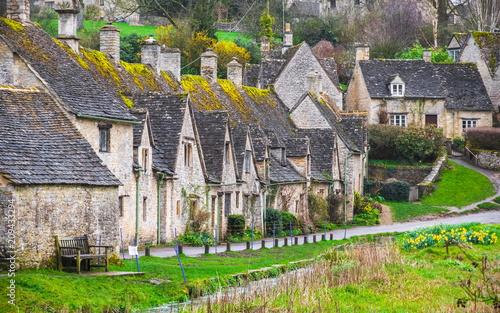 Cotswold stone cottages in Bibury, England photo