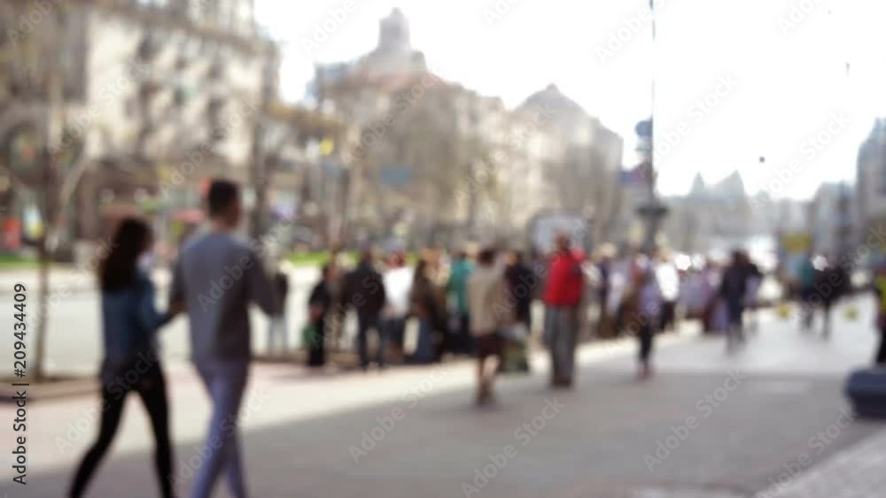 Blurred Background Anonymous crowds of people walking around street in city Blurred Background Anonymous crowds of people walking around street in city