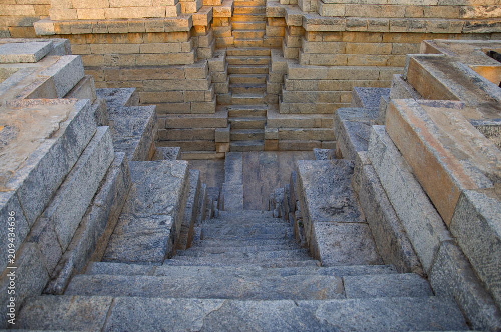 Stepped well at the Mahadeva Temple, was built circa 1112 CE by Mahadeva, Itagi, Karnataka Stepped well at the Mahadeva Temple, was built circa 1112 CE by Mahadeva, Itagi, Karnataka