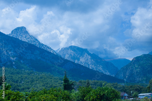 Mountains at nice sunny day. Beautiful natural landscape in the summer time. Idyllic summer landscape with clear mountain 