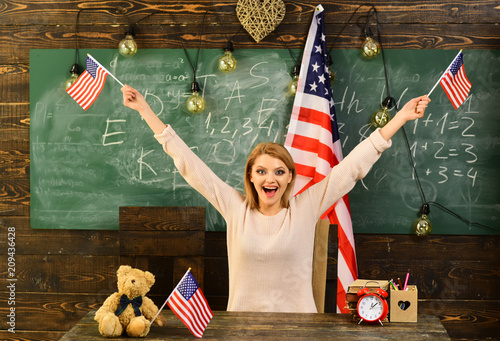 Patriotism and freedom. patritism of happy woman celebratin independence day of usa.