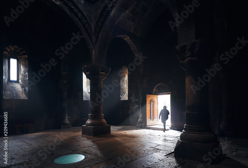 Interior view of ancient Christian Church of Geghard, located in gorge of mountain river. Unique architectural structure in Armenia. Unesco World Heritage Site.