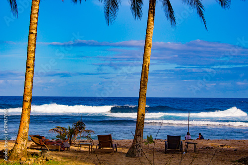 Siargao, PHILIPPINES - Feb 15, 2018: people rest on the beach of the island. photo