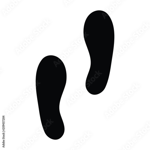 A black and white silhouette of human shoe prints