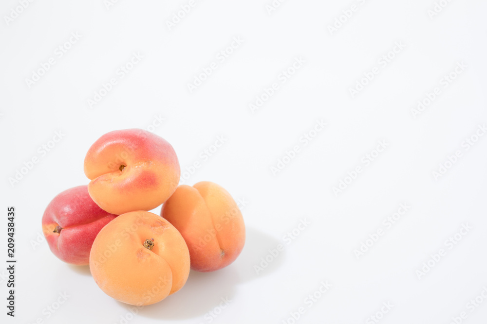 Fruit composition, apricots isolated in a white background Fruit composition, apricots isolated in a white background