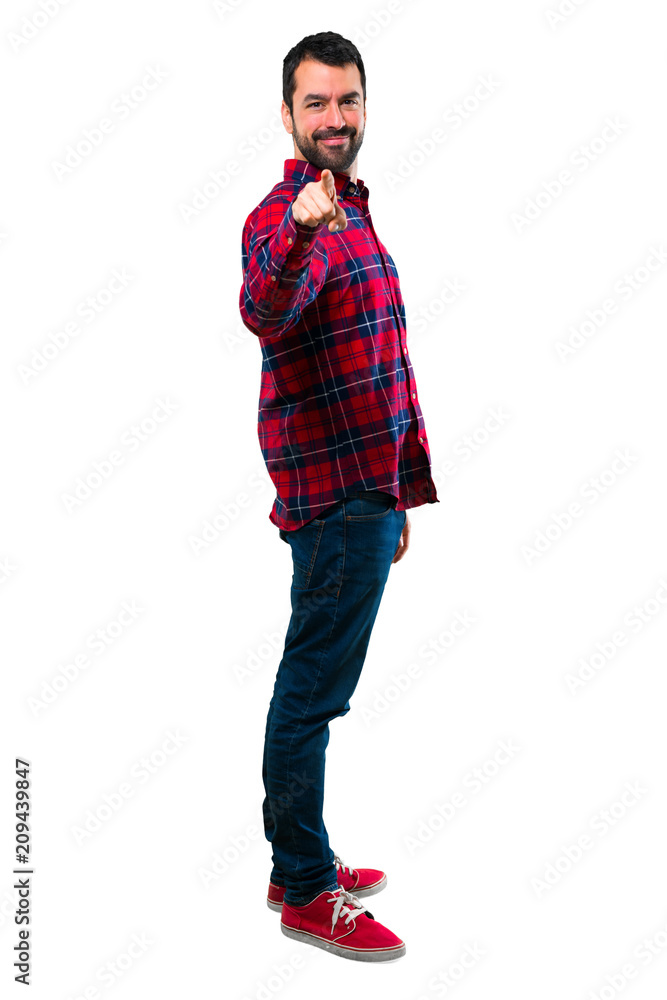 Fototapeta premium Handsome man points finger at you