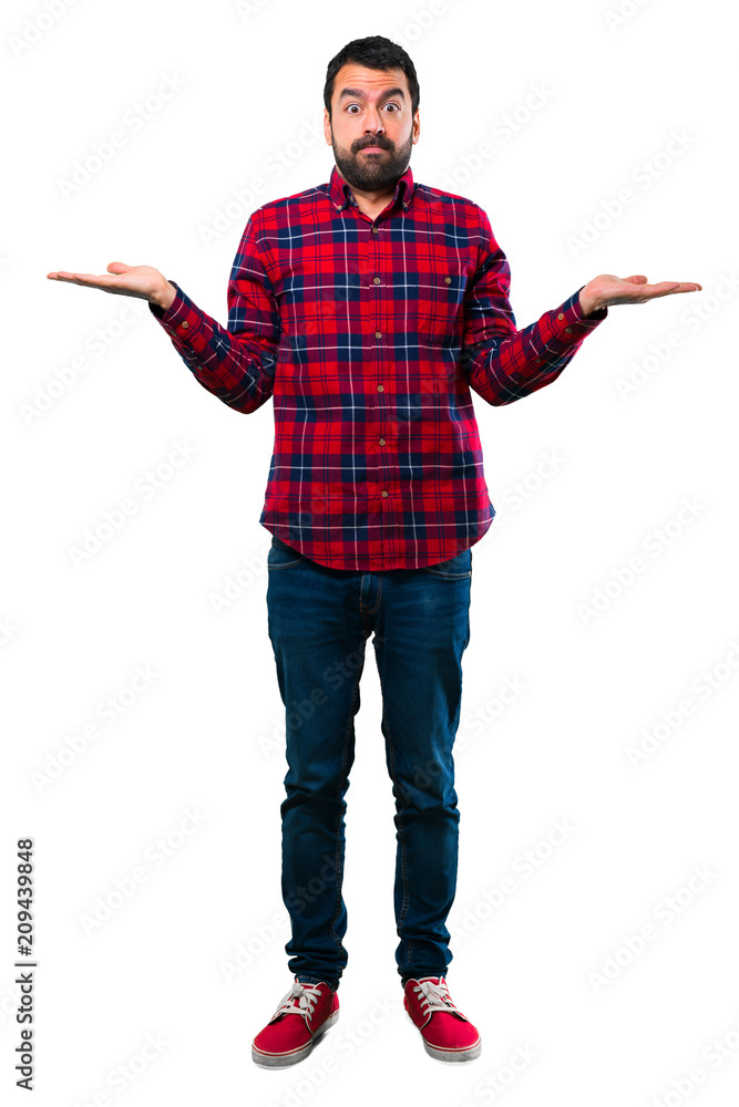 Handsome man having doubts and with confuse face expression Handsome man having doubts and with confuse face expression