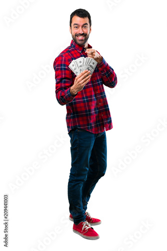 Handsome man taking a lot of money