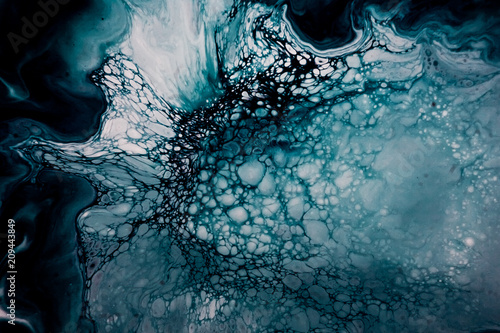 Abstract painting, can be used as a trendy background for wallpapers, posters, cards, invitations, websites. Modern artwork. Marble effect painting. Fluid art. Mixture of acrylic paints. photo