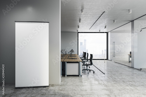 Coworking office with empty banner