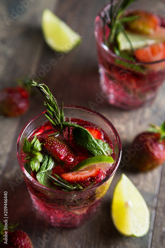 Natural lemonade with strawberry lime and herbs