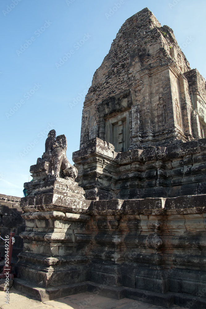 Naklejka premium Siem Reap Cambodia, view of Pre Rup a 10th century hindu temple with stone animal statues on staircase