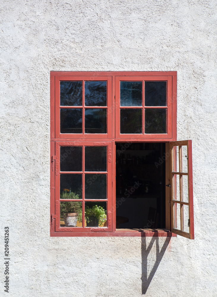 Obraz premium Red opened window.