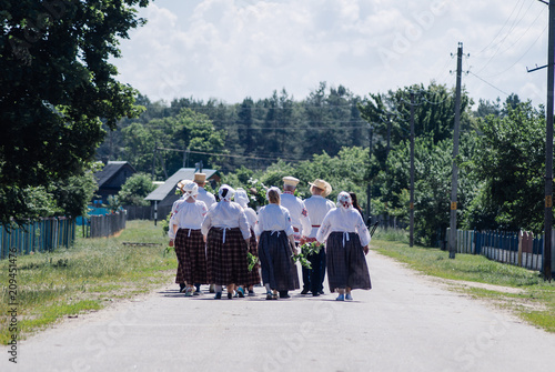 Commune village, Belarus-July 15, 2018, folk holiday of mermaids, people in traditional dress,