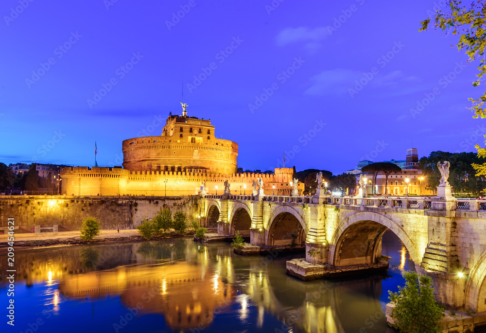 Night view of Castle Sant Angelo (Mausoleum of Hadrian), bridge Sant Angelo and river Tiber in Roma. Italy.