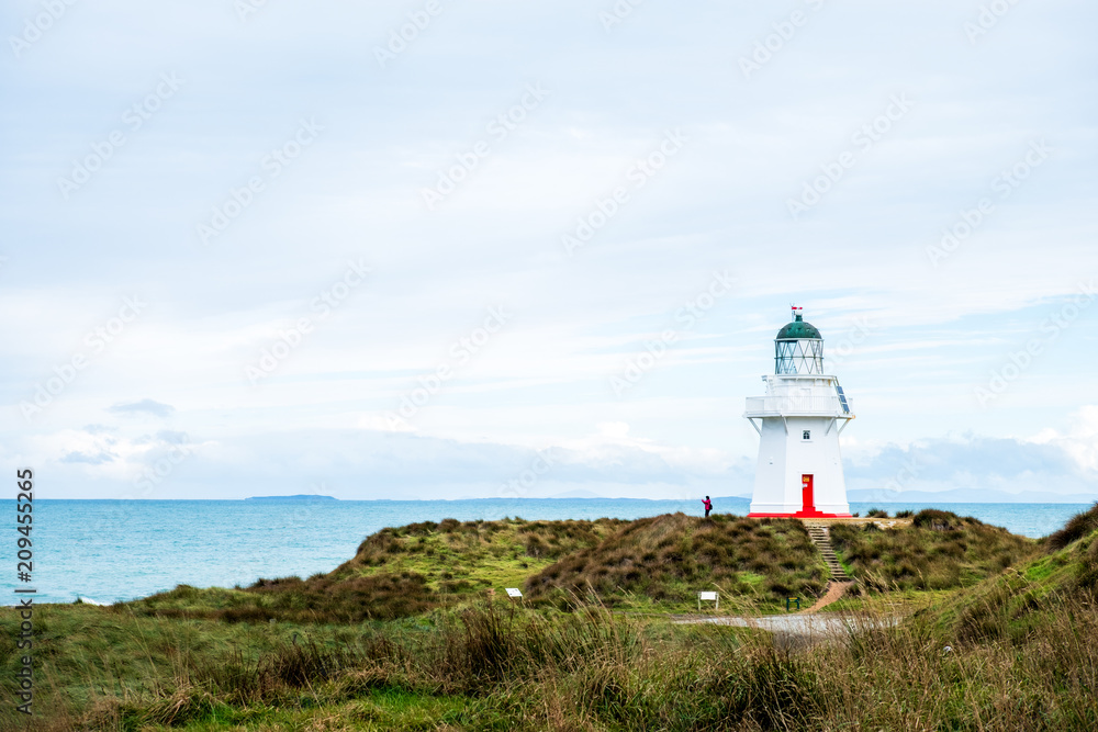 Waipapa point, the lighthouse, ocean and cloudy. Waipapa point, the lighthouse, ocean and cloudy.