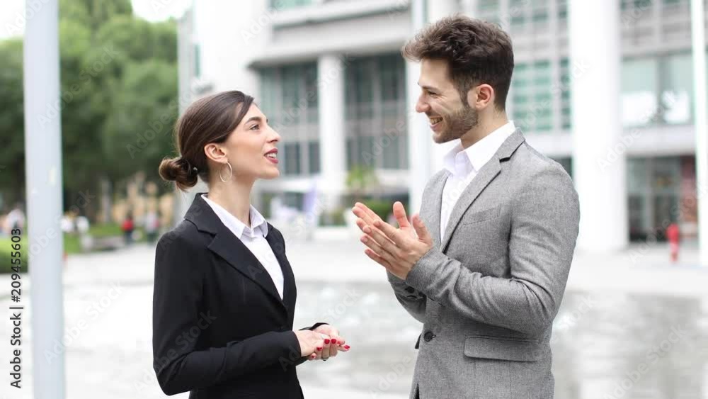 Business partners discussing together Business partners discussing together
